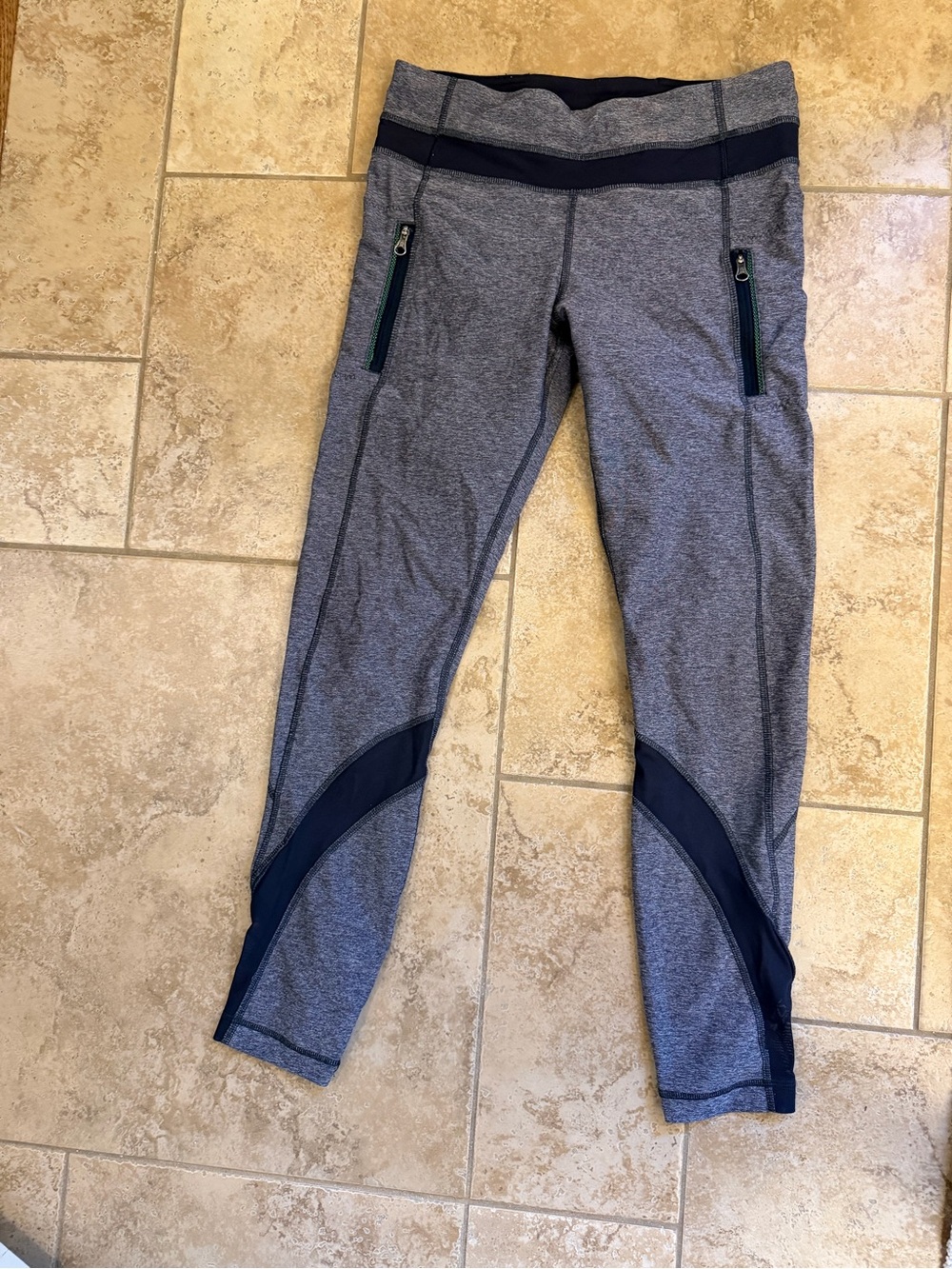 Lululemon size 6 Heather Gray Leggings with Navy Accents